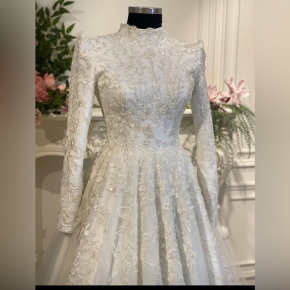 Beautiful bridal full sleeves high neck ballgown.
Purchase for $1,500 - Picture 5 of 5